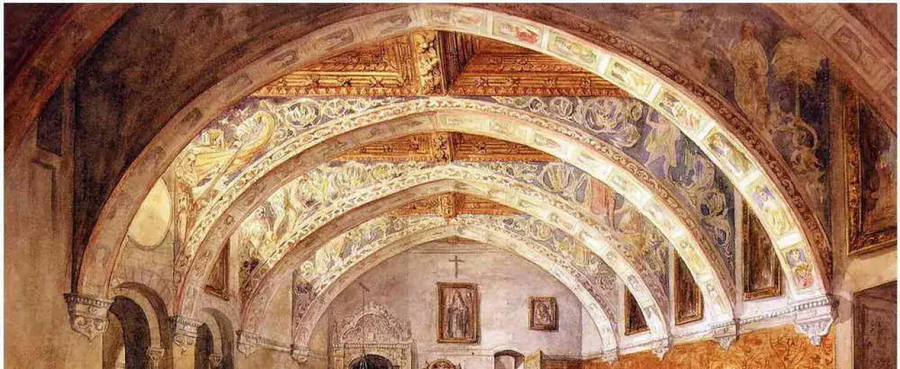Interior de la iglesia de Villanueva de Sigena, con bóvedas decoradas con frescos y arcos ornamentados.