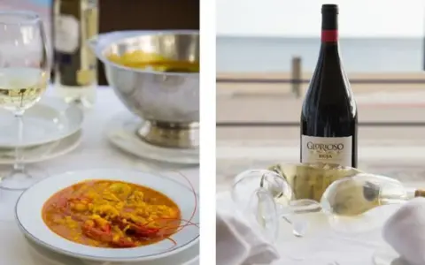 Paella y vino en Islantilla. Descubre dónde comer en Islantilla y disfruta de esta deliciosa combinación.
